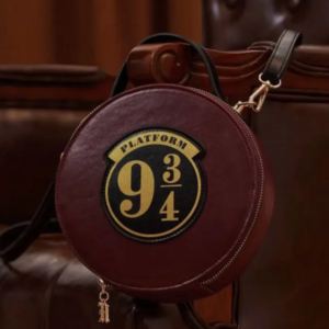 Cartera bolsa de mano redonda Harry Potter Plataforma 9 3/4  Cuerina Bordo - Producto Oficial